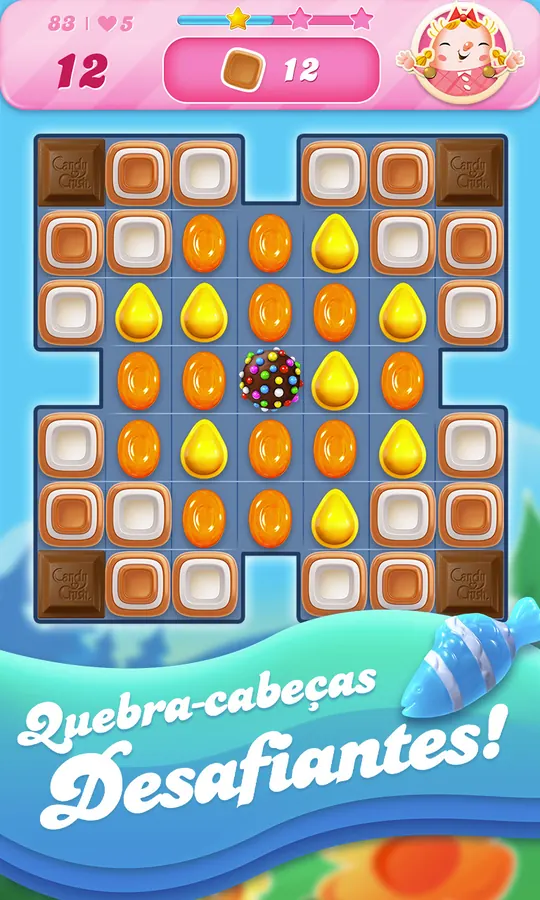 Tabuleiro de Candy Crush Saga com caramelos, blocos de chocolate nos cantos e o contador 12 no topo